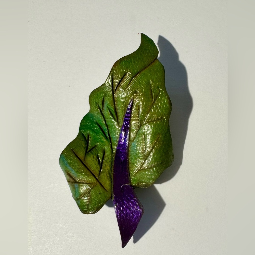Artisan handmade leather leaf brooch.